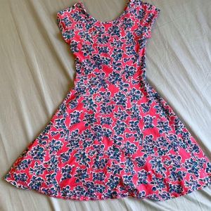 An extra small, coral dress with floral print.